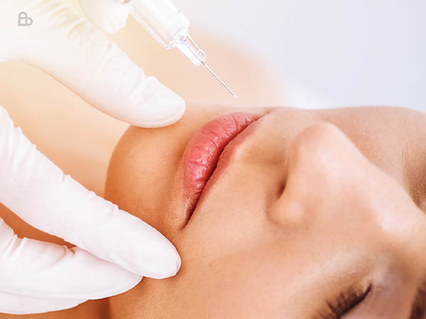 Growth Factor Concentrate therapy performed by a dermatologist for hair and skin regeneration